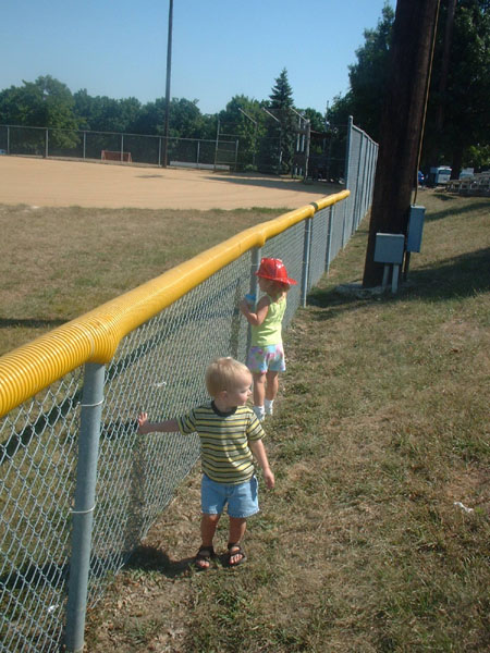 Atticus and Savanah are more interested in playing baseball.jpg 104.9K
